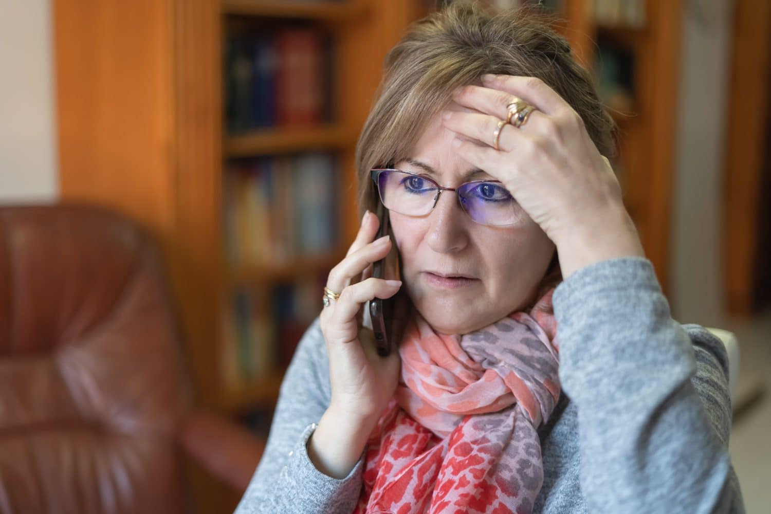 A concerned woman in Indianapolis discusses her social security disability denial with her attorney.