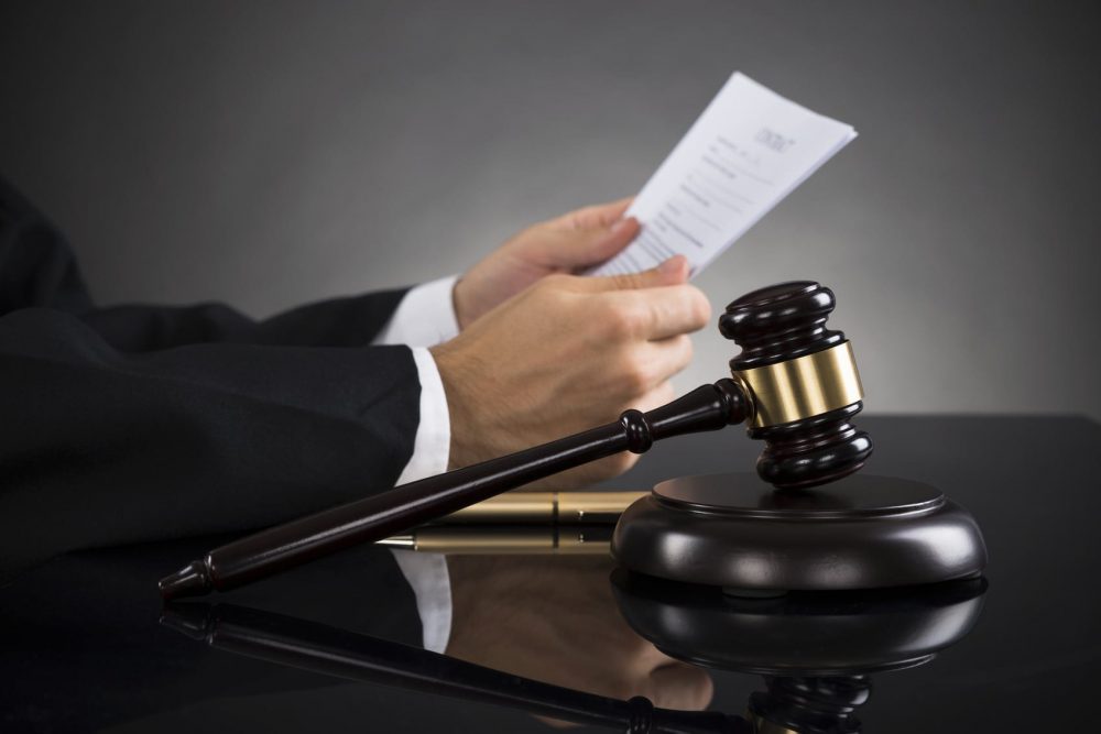 Judge Reviewing Legal Documents Stock Photo