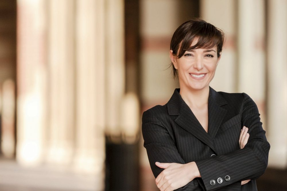 Female Attorney Smiling At The Camera Stock Photo