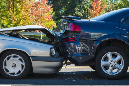Two cars after a rear-end accident on the street in Indianapolis.