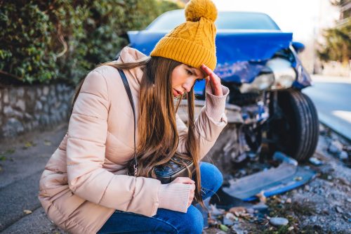 An Indianapolis woman feeling stressed after a car accident.