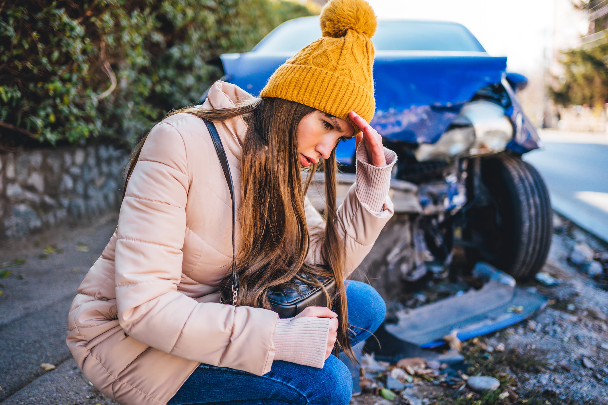 An Indianapolis woman feeling stressed after a car accident.