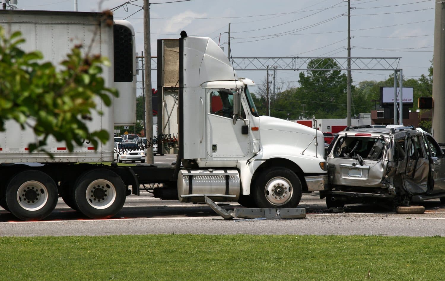 Semi-truck rear-ending an SUV on surface streets in Bloomington, IN